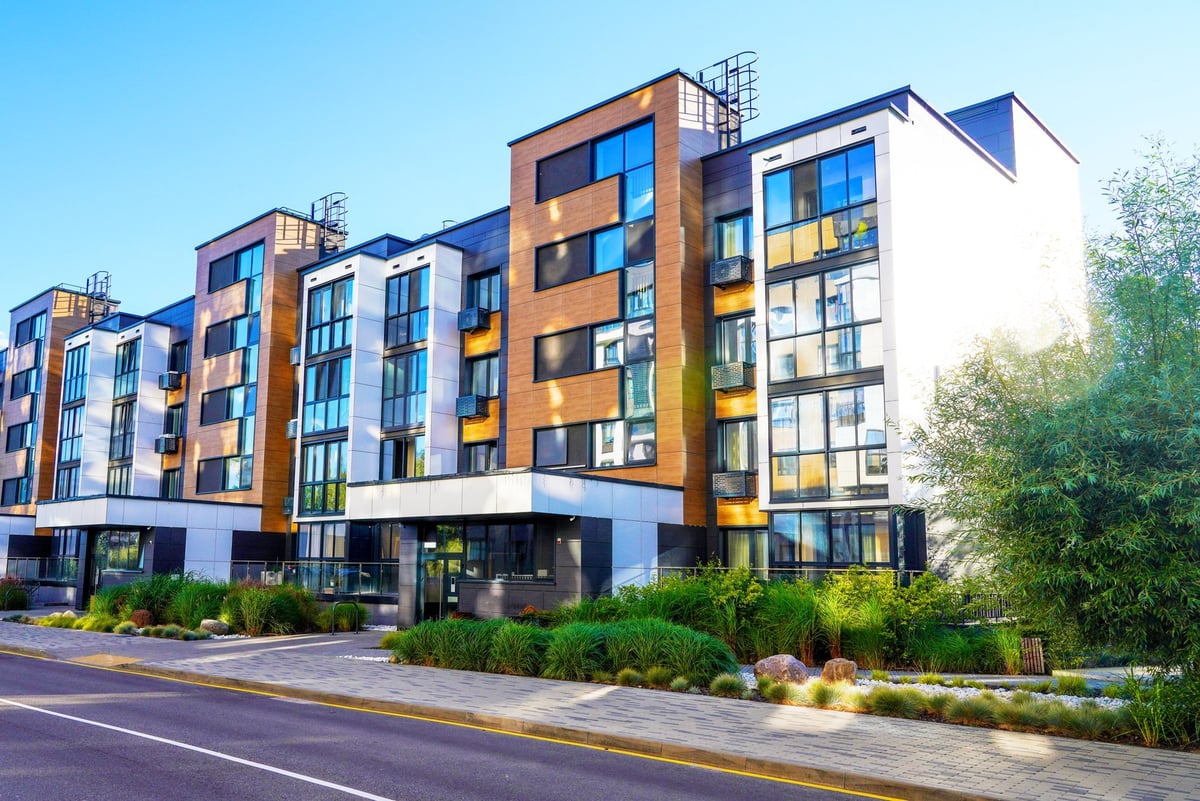 Modern residential apartment building managed as a rental property investment