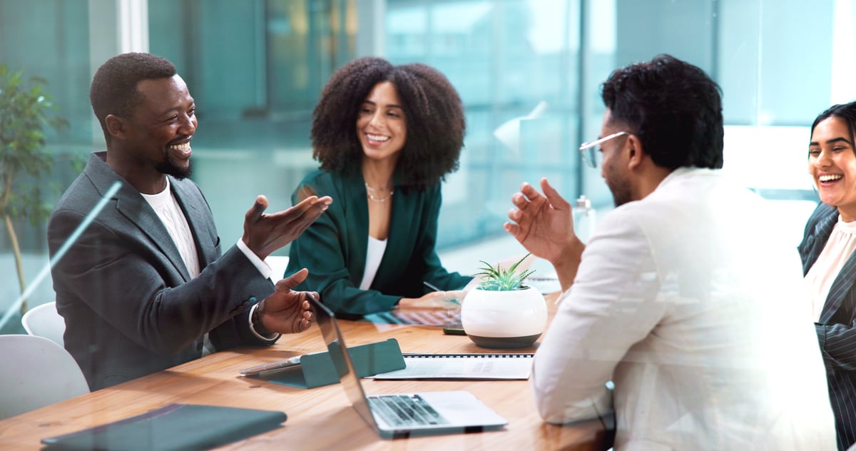 Business professionals collaborating on an investment proposal in an office meeting